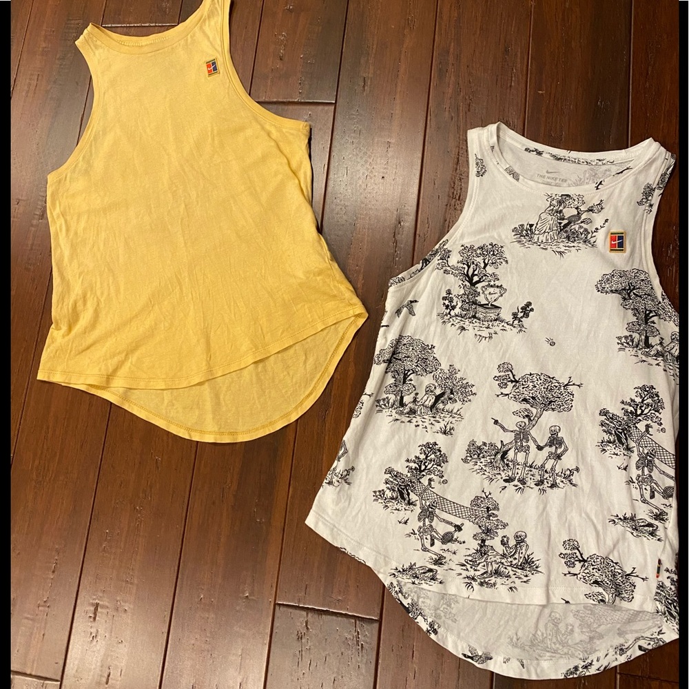 Nike women’s two  tee size XS